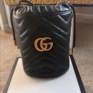 Black Gucci bucket bag- great used condition. Price is firm.